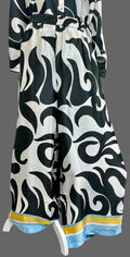 Black and white patterned dress with a yellow and blue accent