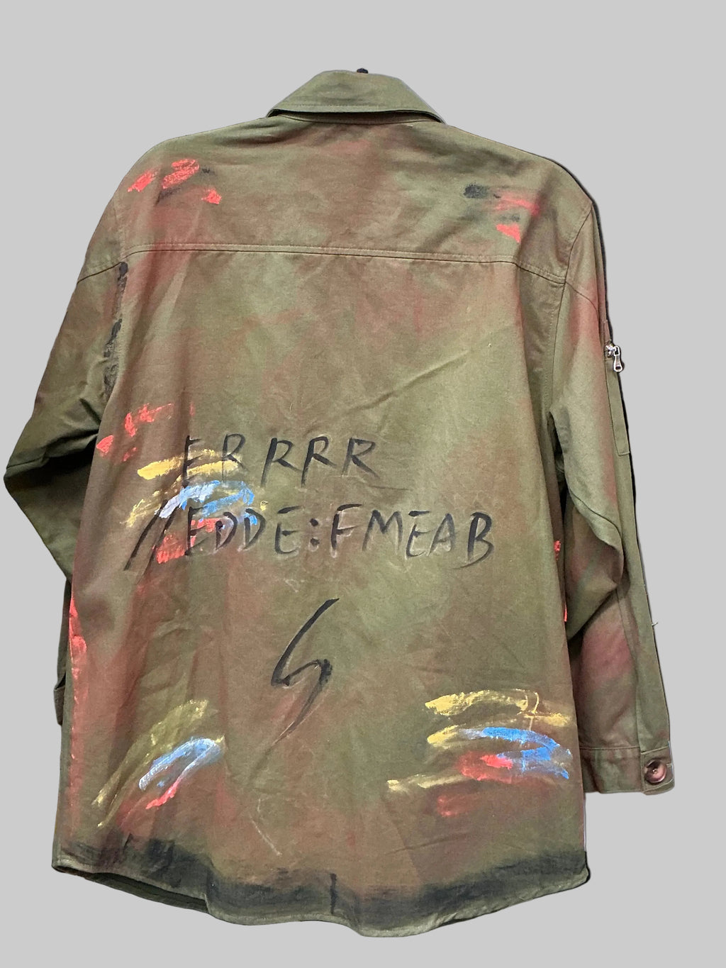 Olive Green jacket with text and paint splashes on a black