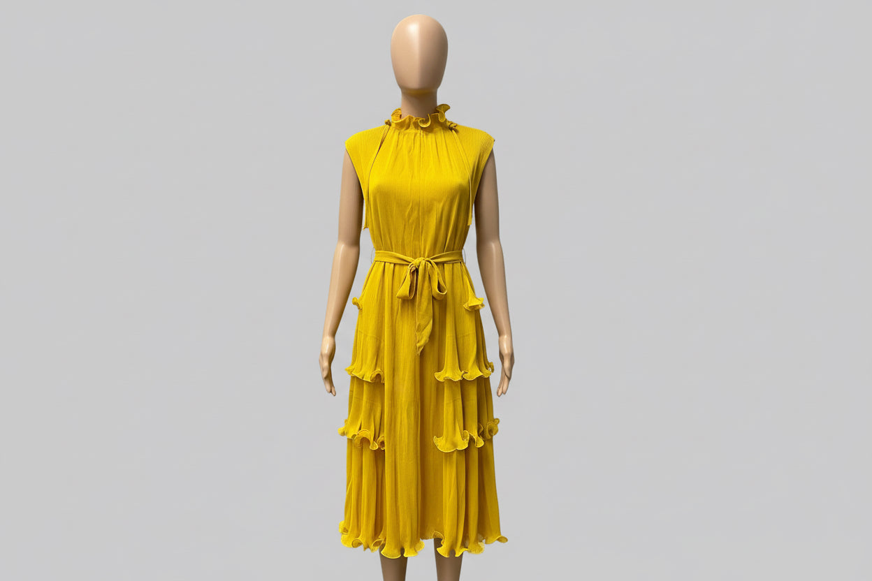 Yellow colored long dress with tiered ruffles on lower half