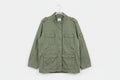 Green jacket on a hanger
