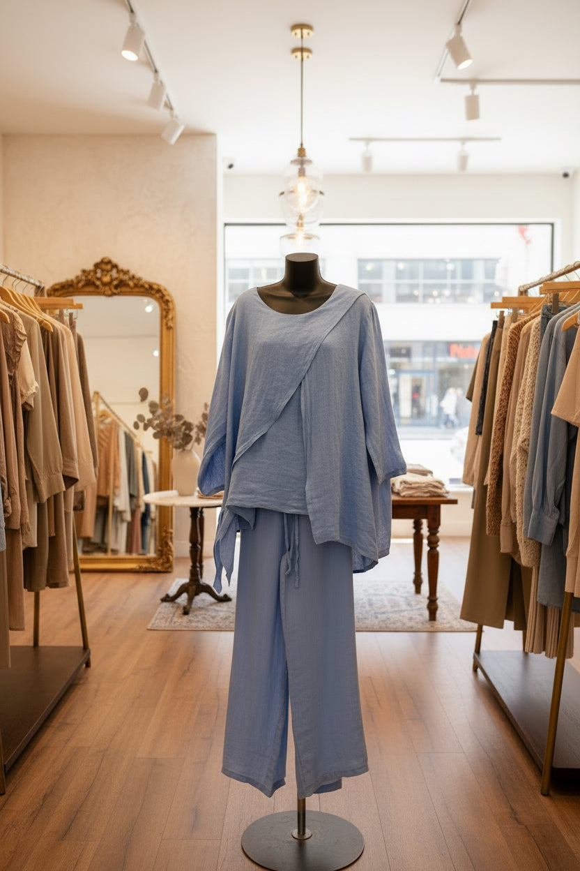 Blue pant set on a mannequin in a boutique