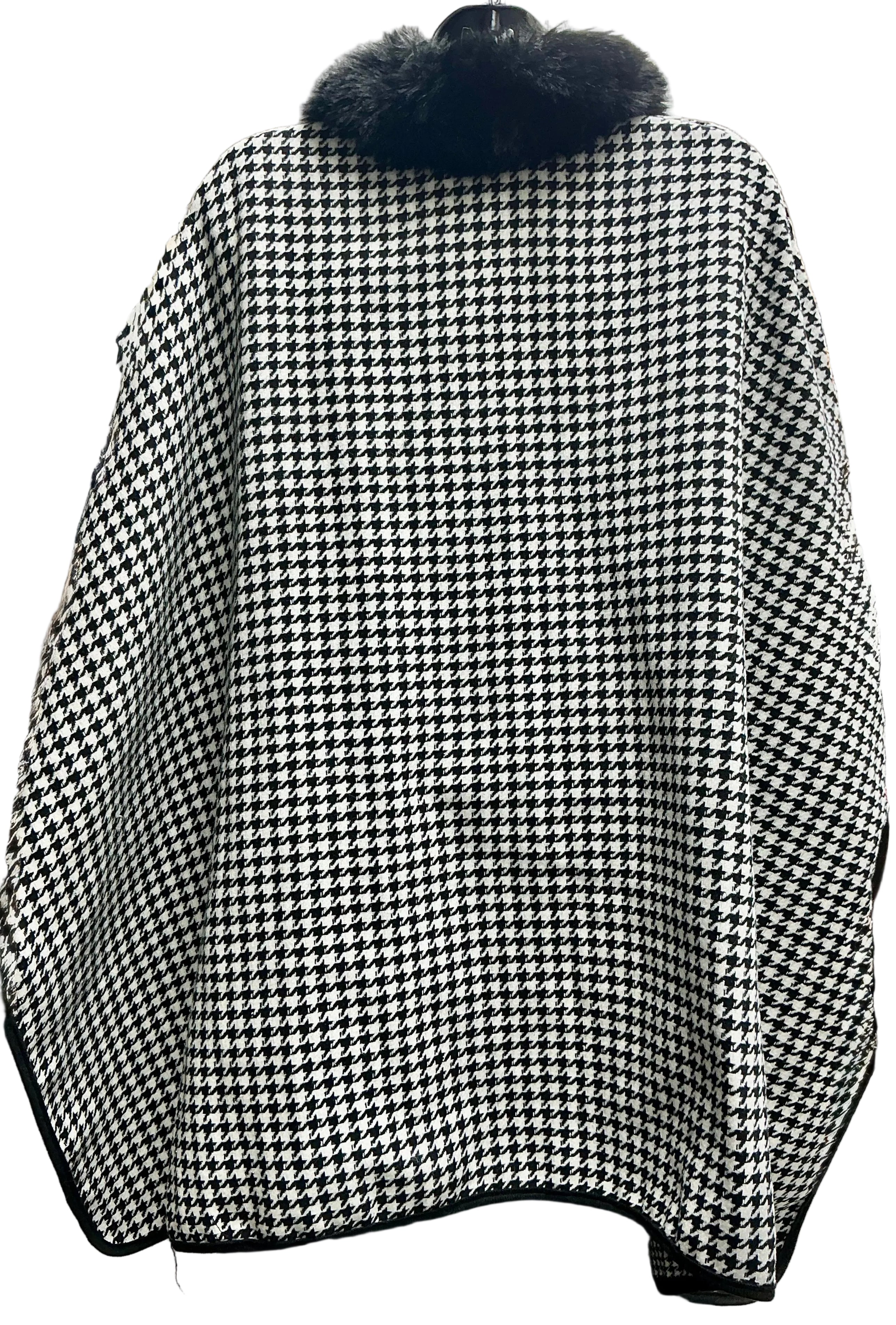 Black and white houndstooth patterned coat with fur collar