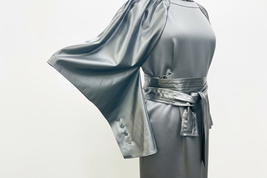 Black dress, vegan leather cape sleeve with buttons, vegan leather belt tied